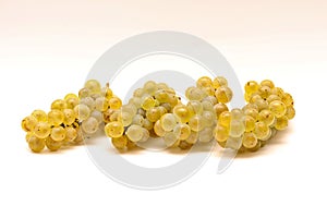 isolated yellow bunch of grapes on a white background