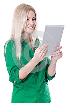 Isolated young attractive blond woman holding tablet pc.