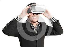 Isolated young businessman with virtual reality glasses