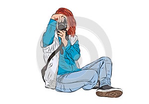 isolated young woman photographer taking photos using her digital camera