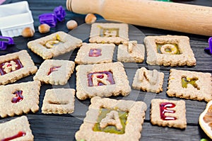 Isomalt stained glass cookies. Christmas or X-mas baking culinary background, cooking recipe