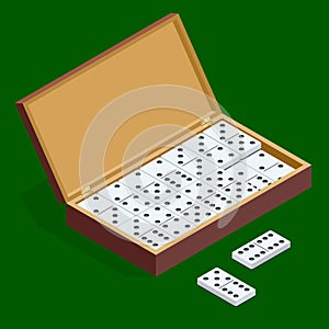 Isomeric set of dominoes in bamboo box isolated on green background