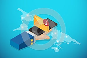 Isometric business hand holding smartphone with envelope and notification bubble on world map, communication and business concept