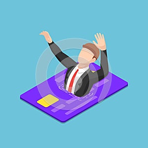 Isometric businessman drowning into credit card