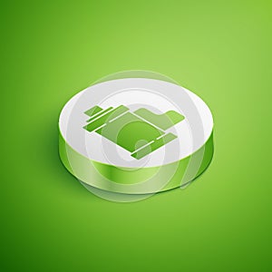 Isometric Camera vintage film roll cartridge icon isolated on green background. 35mm film canister. Filmstrip