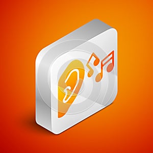 Isometric Ear listen sound signal icon isolated on orange background. Ear hearing. Silver square button. Vector
