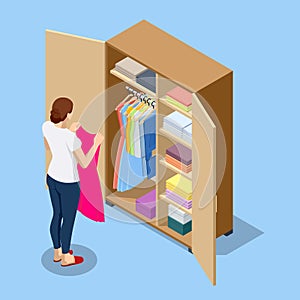 Isometric large wardrobe with things. Woman choosing outfit from large wardrobe closet with clothes and home stuff
