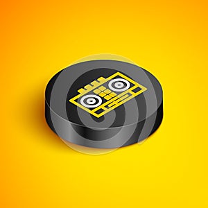 Isometric line DJ remote for playing and mixing music icon isolated on yellow background. DJ mixer complete with vinyl