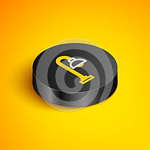 Isometric line Floor lamp icon isolated on yellow background. Black circle button. Vector