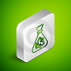 Isometric line Garbage bag with recycle symbol icon isolated on green background. Trash can icon. Recycle basket sign