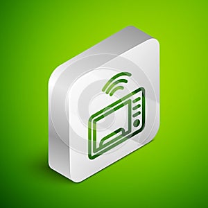 Isometric line Smart microwave oven system icon isolated on green background. Home appliances icon. Internet of things