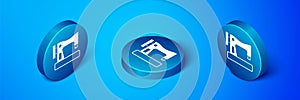 Isometric Sewing machine icon isolated on blue background. Blue circle button. Vector