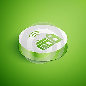 Isometric Smart home with wireless icon isolated on green background. Remote control. Internet of things concept with