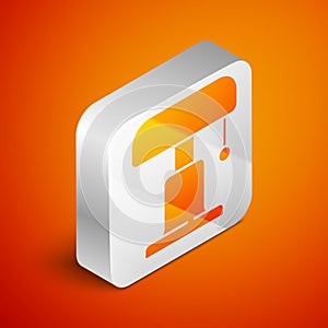 Isometric Table lamp icon isolated on orange background. Silver square button. Vector