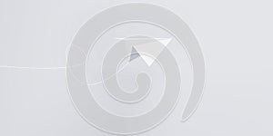 Isometric white paper plane flying on blue background