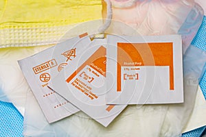 Isopropyl Alcohol Wipes on top of Dressing Gauze