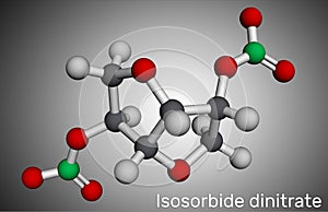 Isosorbide dinitrate, ISDN molecule. It is vasodilator used to treat angina in coronary artery disease. Molecular model. 3D photo