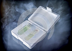 Isothermal box with two vaccines extracted of the freezer, conceptual image