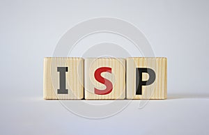 ISP - Internet Service Provider symbol. Concept word ISP on wooden cubes. Beautiful white background. Business and ISP concept.