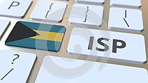 ISP or Internet Service Provider text and flag of the Bahamas on the computer keyboard. National web access service