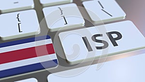 ISP or Internet Service Provider text and flag of Costa Rica on the computer keyboard. National web access service