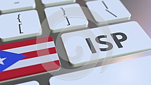 ISP or Internet Service Provider text and flag of Puerto Rico on the computer keyboard. National web access service