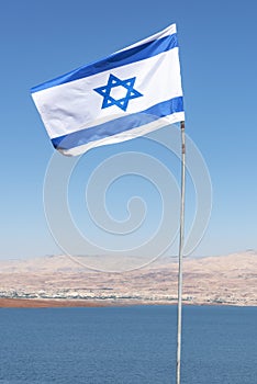 Israel, Dead Sea, 11-05-2019 View of the Israeli flag on the coast along the water of the Dead Sea in Israel.