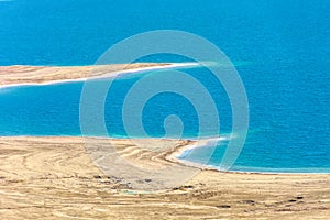 Israel Dead sea. View over a part of the Dead Sea with its erratic beaches from a high point of view