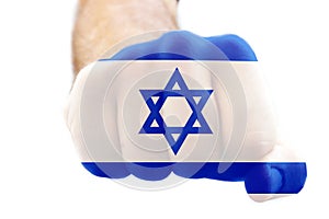 Israel Flag on the man\'s hand clenched fist. Concept: conflict between Israel, Palestine, Arab states and Iran