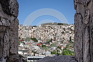 Israel-Jerusalem 12-05-2019 view over a sun-drenched Jerusalem city, with its trees old houses, streets from the old city wall.