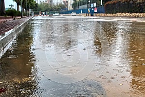 Israel, Winter Weather. Rain, Downpour: Flooding on the cars road.