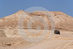 Israeli army Humvee on patrol in the desert