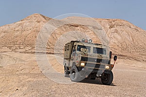 Israeli army Humvee on patrol in the Judean desert