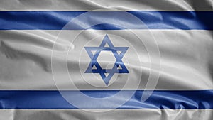 Israeli flag waving in the wind. Close up of Israel banner blowing, soft silk