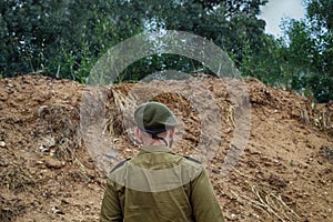 Israeli soldier on a hill during a military exercise in army Israel Defense Forces, IDF, Tzahal photo