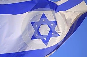 Israeli waving flag closeup