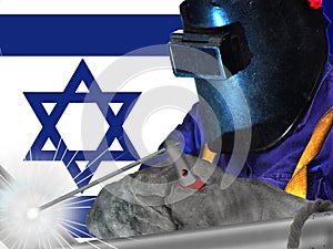 ISRAELITE WELDER WITH BACKGROUND OF HIS FLAG