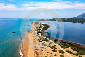 Issos beach on Corfu, near Agios Georgios, Greece. Aerial drone view of Issos beach and Lake Korission, Corfu island, Ionian Sea,