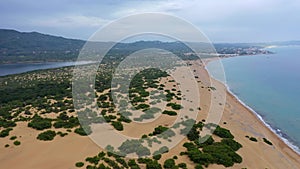 Issos beach on Corfu, near Agios Georgios, Greece. Aerial drone view of Issos beach and Lake Korission, Corfu island, Ionian Sea,