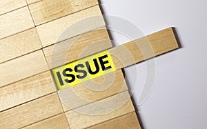 Issue word on wooden cubes. Issue concept