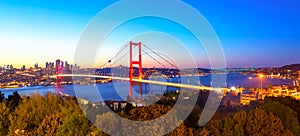 Istanbul Bosphorus Bridge or 15th July Martyrs Bridge at sunset. Istanbul, Turkey