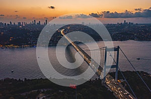 Istanbul Bosphorus Bridge at Dusk Sunset with Car traffic jam and City Skyline, Aerial View