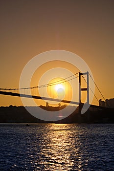 Istanbul. Bosphorus bridge at sunset, view of the European part of the city