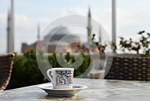 Istanbul. A cup of coffee. Hagia Sophia on background