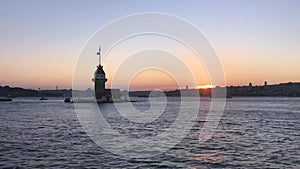 Istanbul Maiden Tower kiz kulesi at sunset on the entrance to Bosporus Strait in Istanbul, Turkey.