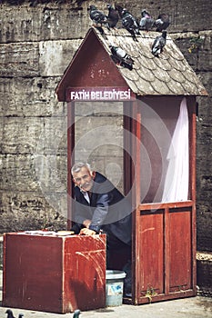 ISTANBUL - MAY 20: An street dove food seller on May 20, 2015 in