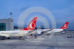Istanbul, Turkey - 2019-11-25: Airliners of Turkish Airlines refueling at a terminal of Istanbul Havalimani Airport