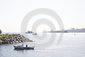 ISTANBUL, TURKEY - APRIL 13, 2024: Boats at the pier in the Uskudar area photo