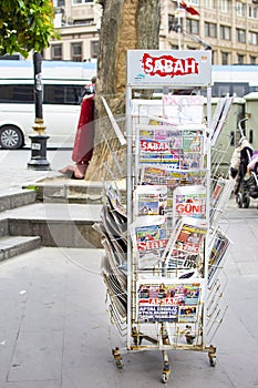 Newspapers on the stand. Financial, medical, political, economic news in Turkey.