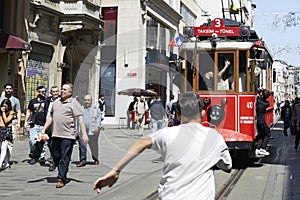 Istanbul, Turkey - April 12, 2024: Tram on Istiklal street